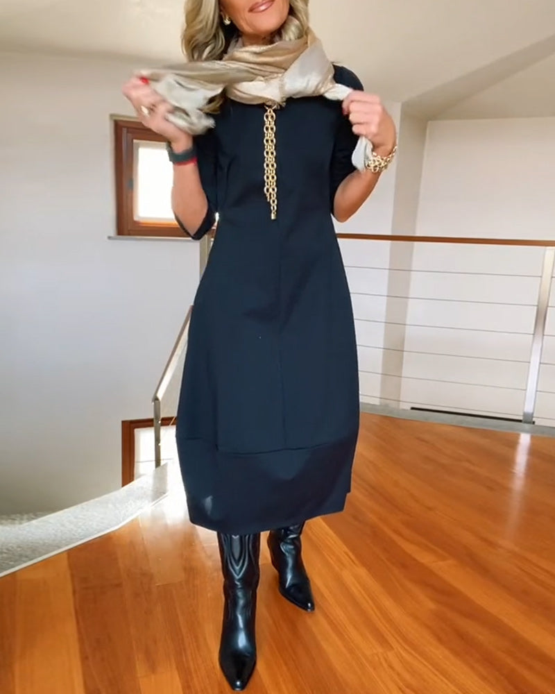 Robe élégante de couleur unie avec poche et col rond