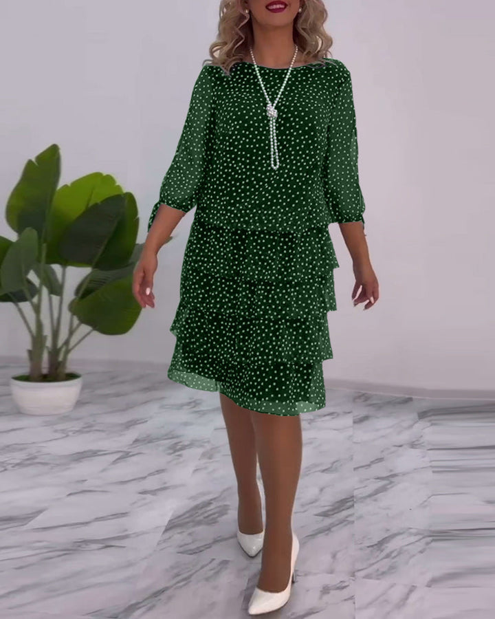 Robe élégante superposée à imprimé pois