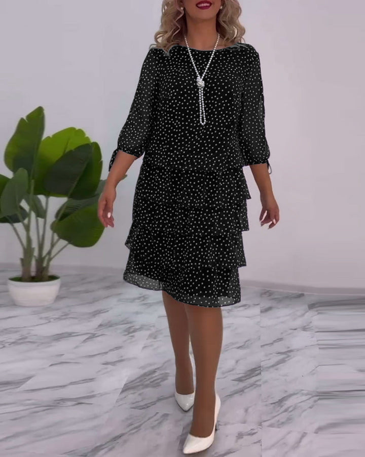 Robe élégante superposée à imprimé pois