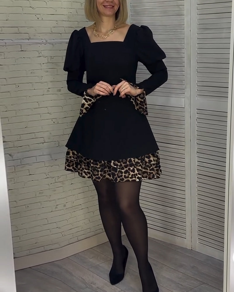 Robe élégante à manches bouffantes et imprimé léopard