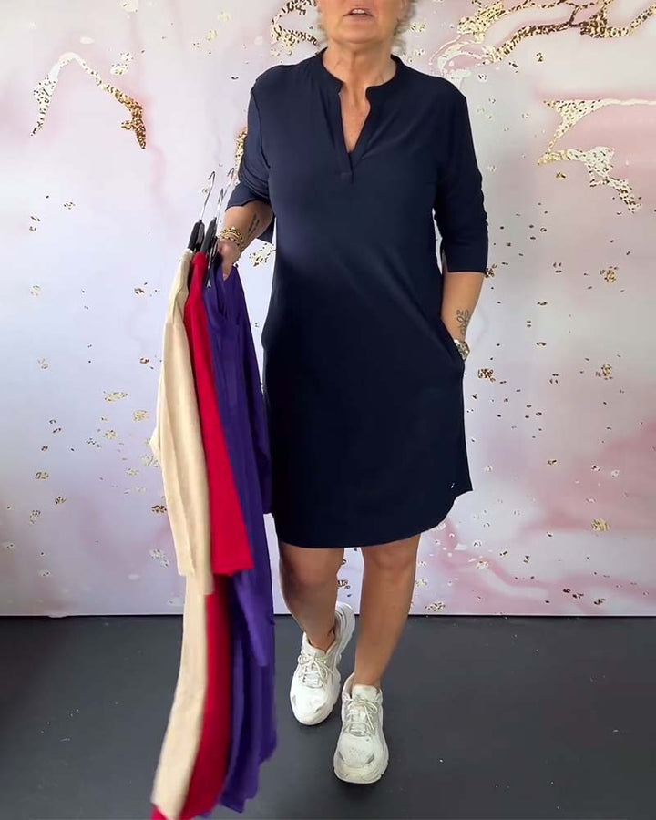 Robe à couleur unie et col en V