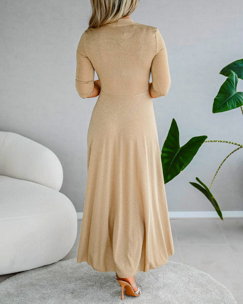 Robe élégante de couleur unie avec col en V et manches trois-quarts
