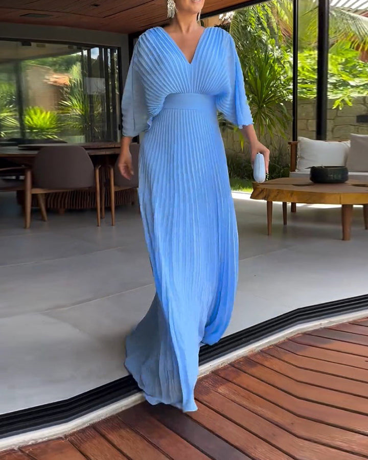 Robe à plis et taille cintrée