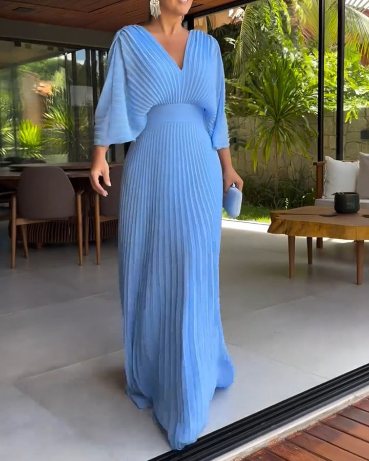 Robe à plis et taille cintrée