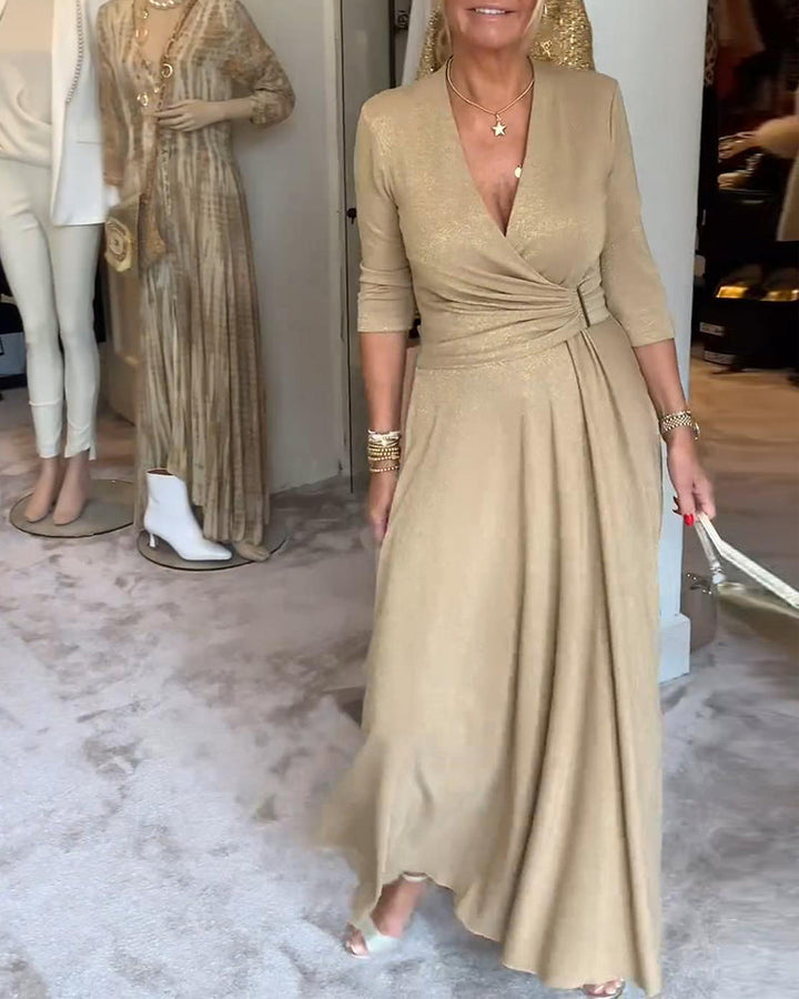 Robe élégante de couleur unie avec col en V et manches trois-quarts