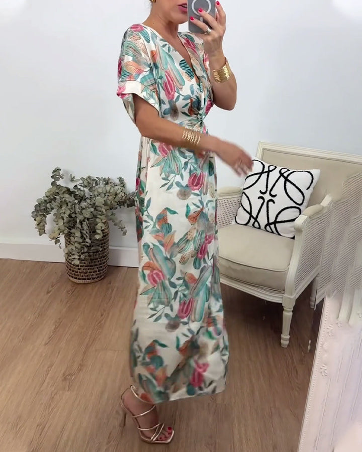Robe élégante torsadée à col en V et imprimé botanique