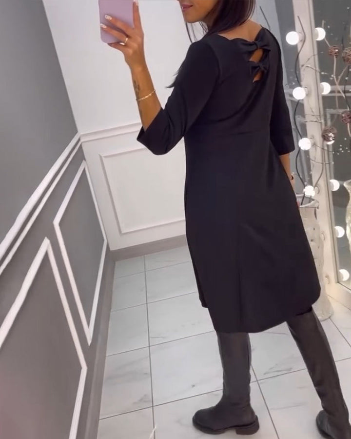 Robe unie avec nœud au dos