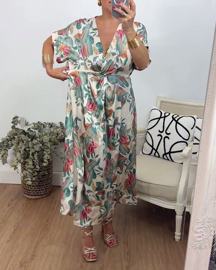 Robe élégante torsadée à col en V et imprimé botanique