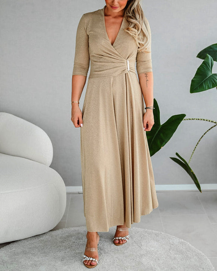 Robe élégante de couleur unie avec col en V et manches trois-quarts